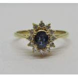 18ct oval sapphire and diamond cluster ring, size L/M, 3.2g