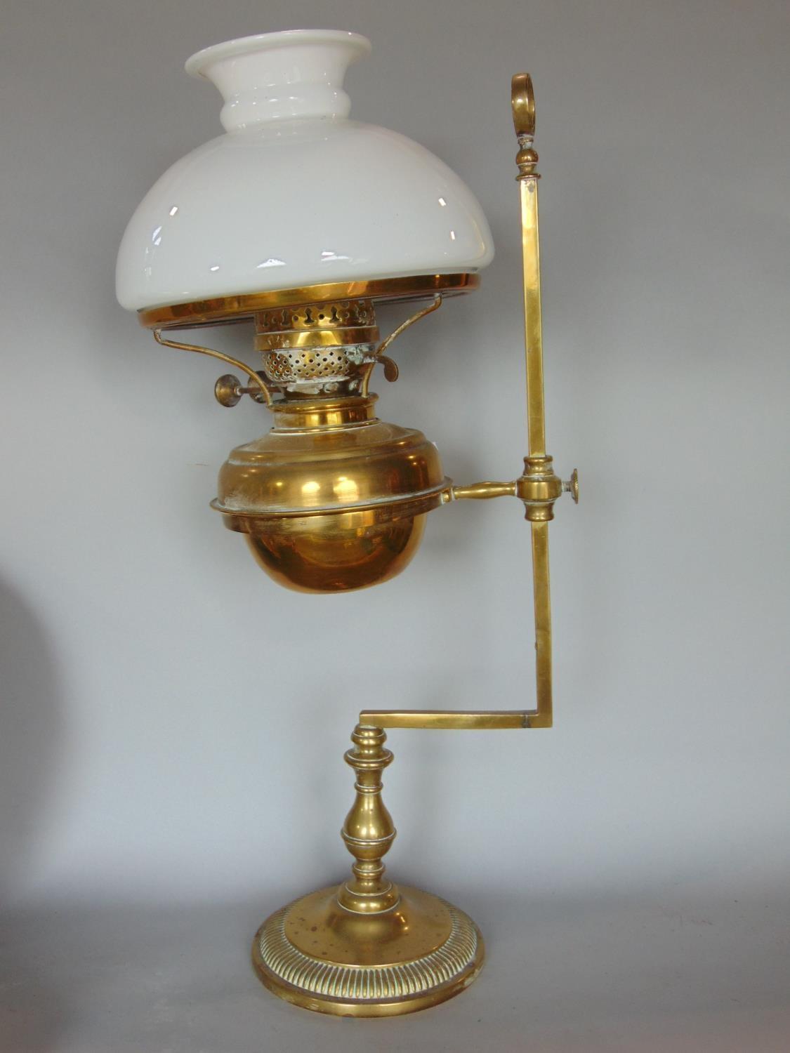 A Victorian brass students oil lamp on adjustable frame, a further Victorian brass oil lamp, two - Image 2 of 2