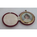 E M Charlton (?) late 19th/early 20th century British school - Bust length miniature portrait of a