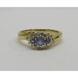 9ct sapphire and diamond crossover ring, size O, 3.5g