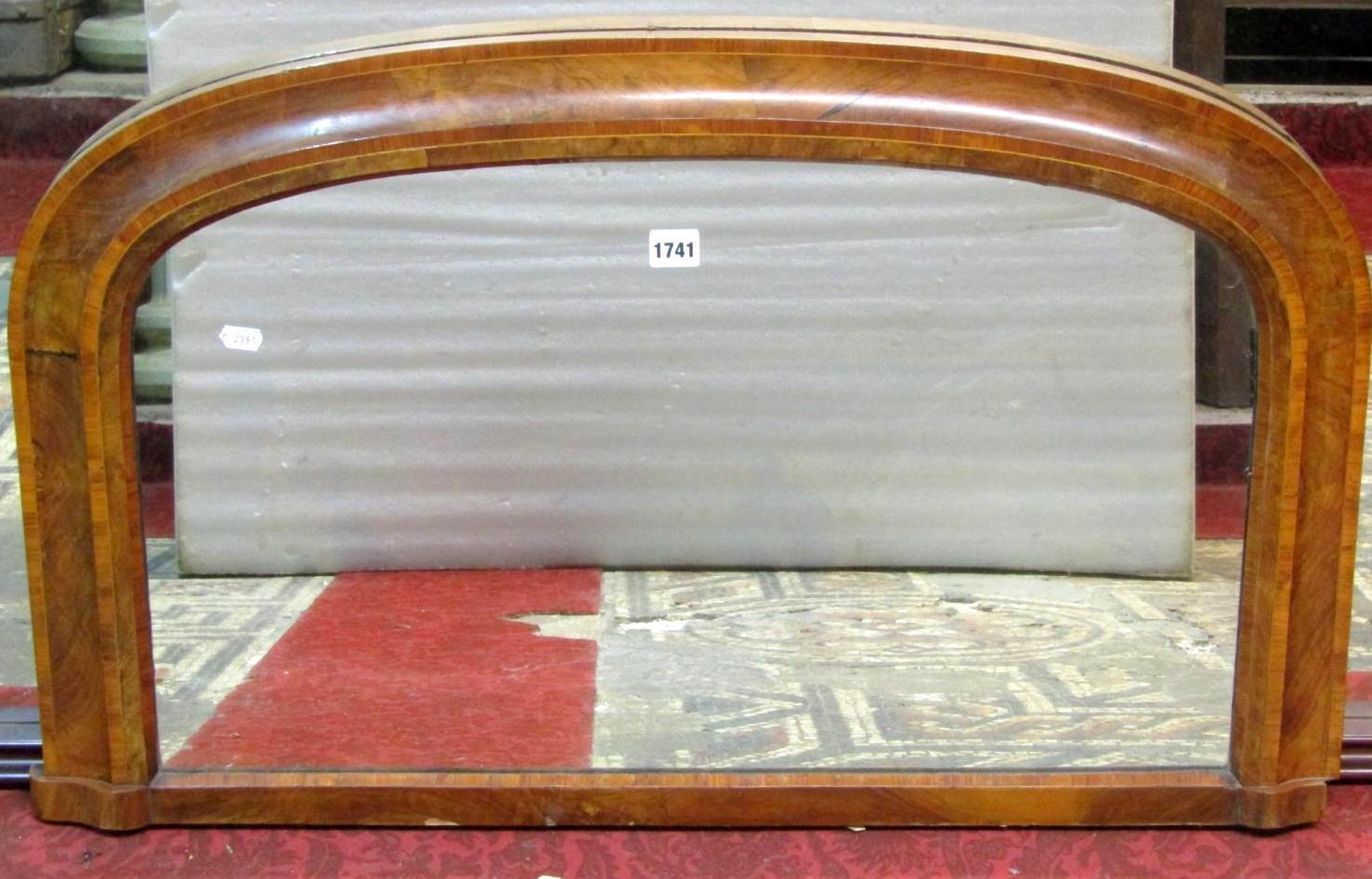 A small Victorian walnut veneered and crossbanded chimney glass with moulded arched frame, 88 cm