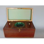 19th century, probably plum pudding mahogany and boxwood inlaid tea caddy, the hinged lid