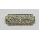 Art Deco diamond plaque brooch of openwork design, unmarked bi-colour metal, 4.7 x 1.7cm approx, 8.