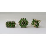 Three 9ct green gem and diamond set dress rings, 10g total (3)