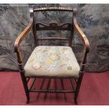 A regency beechwood Countrymade elbow chair with pierced splat, further bobbin rails and hand worked