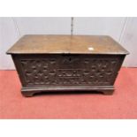 A good, small 18th century oak box, the front elevation with original carved abstract floral detail,