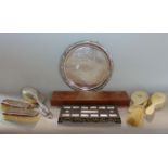 Three hallmarked silver backed brushes, a further hallmarked mirror, a silver plated serving tray