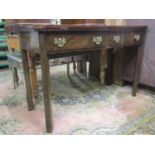 A Georgian style mahogany side table the serpentine front fitted with two frieze drawers raised on