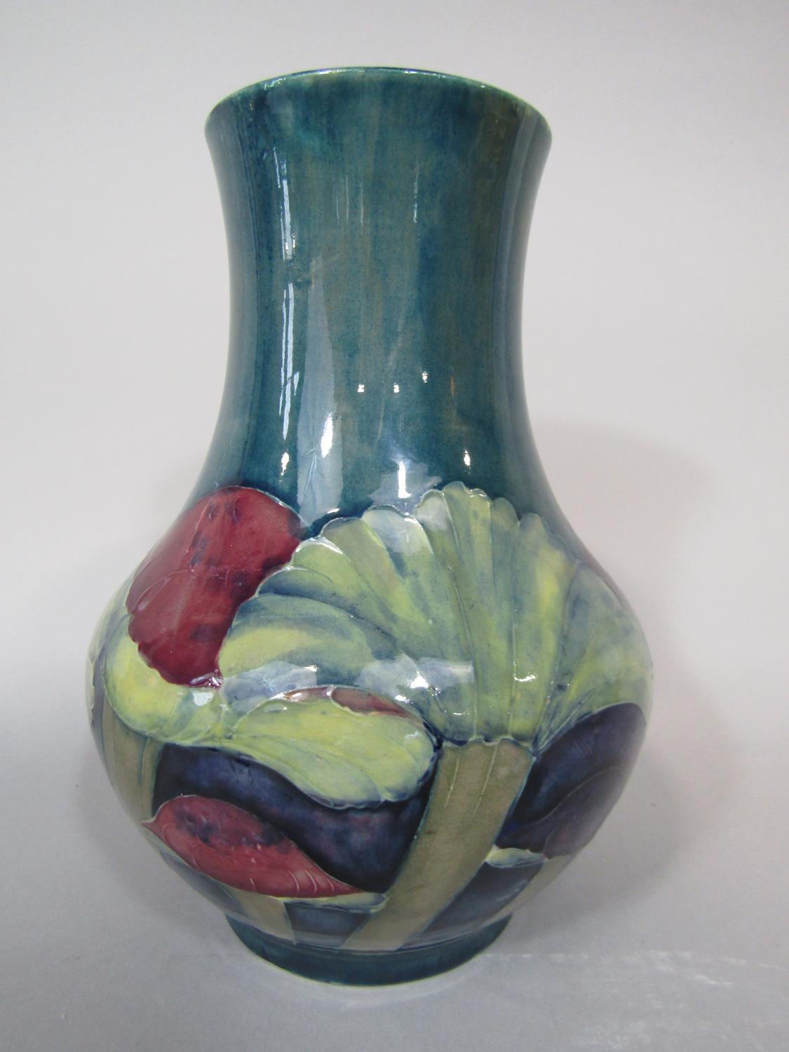 A large Moorcroft vase in the Claremont pattern, with toadstools on a green and blue graduated