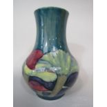 A large Moorcroft vase in the Claremont pattern, with toadstools on a green and blue graduated