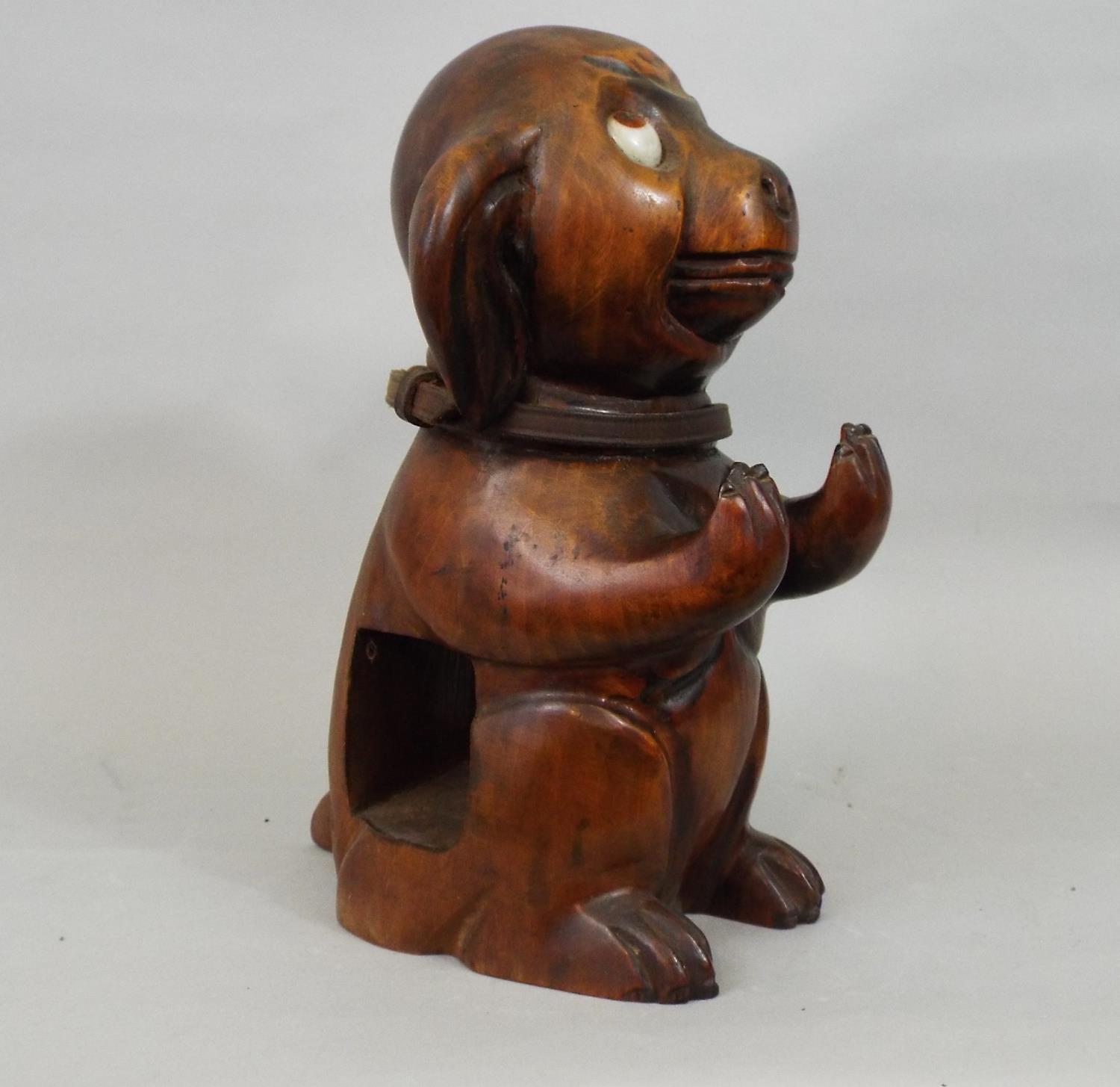 A vintage googly eyed carved timber dog supporting two clothes brushes, 25cm high - Image 3 of 3