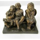 Juan, Clara. Cast bronze group of 3 amused and contented children sitting upon a bench. 15cm long