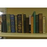 A collection of late 19th/early 20th century topographical and travel books, some with decorative