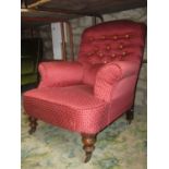 A Victorian drawing room chair with swept and rolled arms, lattice patterned plum ground upholstery,