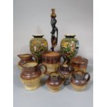 A collection of 19th century salt glazed stonewares with relief moulded decoration comprising a