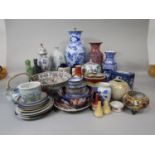 A quantity of various oriental ceramics including a blue and white lamp base, an imari bowl and