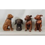 Four various carved hardwood figures of dogs, 36cm max