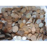 A large unsorted collection of English bronze and nickle plated coinage