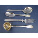 Three Danish Georg Jensen silver pieces of flatware comprising two spoons and a fork with stylised