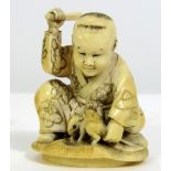 Meiji Period - Ivory Okimono of a boy about to club a rat, signed, 6cm max