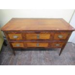 A late 18th century/early 19th century continental commode with two drawers, crossbanded borders,