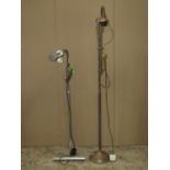 Two contemporary standard/reading lamps of varying design with adjustable stems