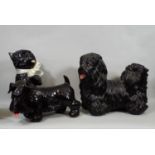 Eight whimsical figures of dogs, one in the Art Deco style, further Chinese example, etc, 26 cm in