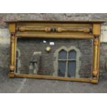 A late Regency/William IV gilt framed chimney glass with split column surround, moulded and