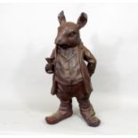 A large cast iron model of a rat dressed in waistcoat, trousers and boots, 44cm high