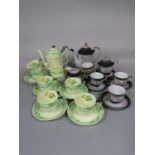 A collection of Japanese eggshell porcelain tea wares with relief moulded dragon decoration
