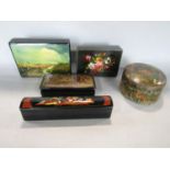 Five various lacquered boxes with typical decoration to include a Troika scene, floral bouquet,