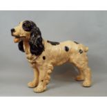 A solid cast figure of a Spaniel in standing position, 36 cm in height