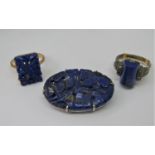 Group of lapis lazuli set jewellery to include a 9ct carved foral plaque ring, a further silver