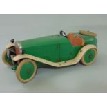 Meccano pre-war clockwork constructor car, with green paintwork, white running boards, red seat (
