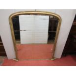 A Victorian overmantle mirror with arched and moulded frame with original gilded finish 127cm x