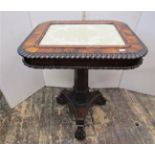 A Regency rosewood centre table of square cut form, with upholstered centre, within a gadrooned