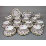 A collection of Royal Crown Derby Royal Antoinette pattern tea wares comprising teapot and cover,
