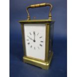 Good quality brass cased repeater carriage clock, twin drive movement striking on a gong, 12.5cm