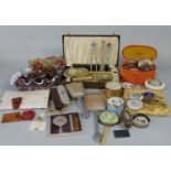 Collection of vintage ladies table items including powder compacts, hair clips, a cased brush and