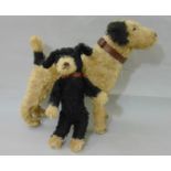 Two vintage soft toy dogs; a terrier with stitched nose, mouth and claws and a docked tail, height