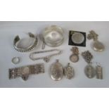 Collection of silver / white metal jewellery to include a good quality hinged bangle with engine