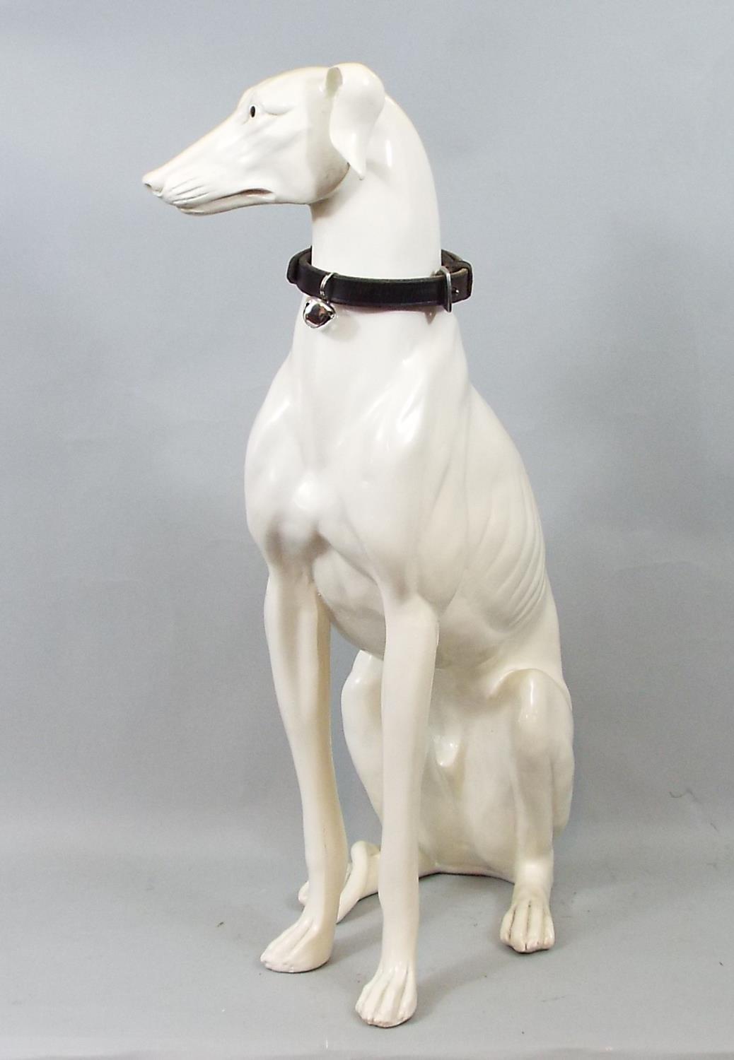 A resin figure of a seated Whippet, 53 cm - Image 2 of 2