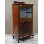 An inlaid Edwardian mahogany music cabinet with satinwood banding boxwood and chequered stringing,