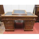 A good quality mid-Victorian period mahogany pedestal writing desk, fitted with an arrangement of