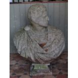 A good and large weathered composition stone two sectional head and shoulder bust of a Roman