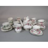A collection of Royal Albert Lavender Rose pattern tea wares comprising teapot, milk jug, four cups,