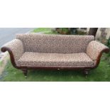 A Regency scroll end sofa, showwood frame with acanthus and other detail, raised on four carved