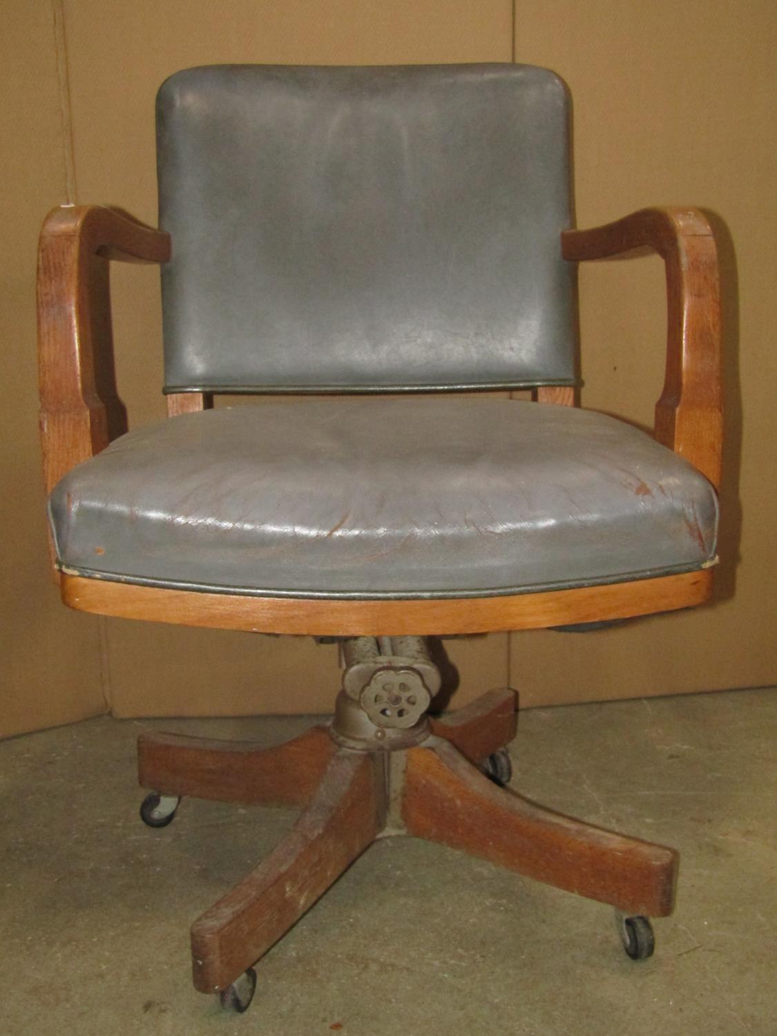 A vintage oak framed swivel office desk chair with faux leather upholstered seat and curved back - Image 2 of 4