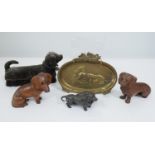 A small Dachshund related collection including a brush with felt cover in the form of a dog, a