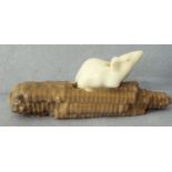 A Copenhagen porcelain figure of a white rat upon a partially nibbled sweetcorn, model number 512,